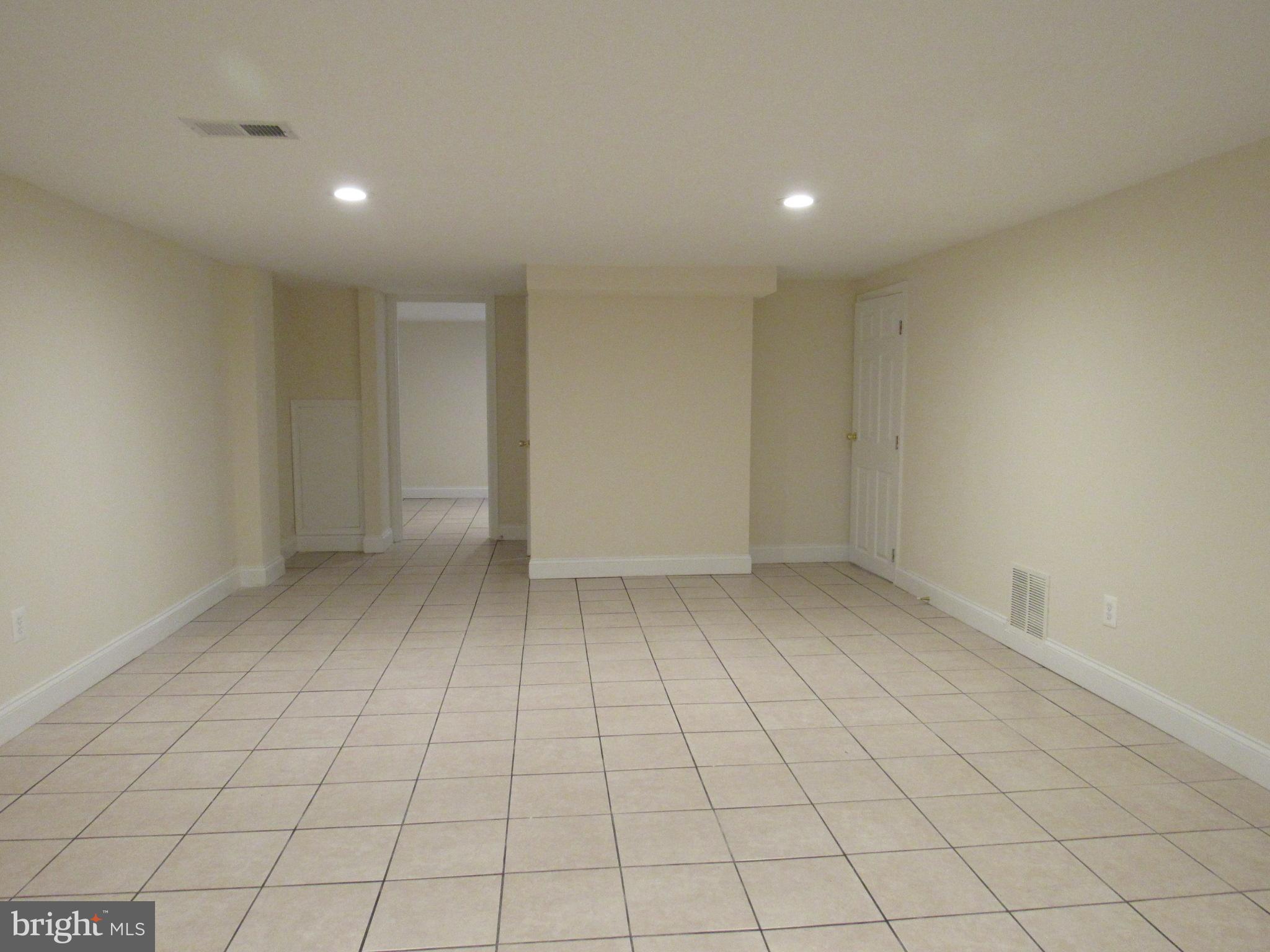 1700 Tioga Road Fort Washington, MD 20744 - Photo 22 of 30 Lower Level Family Room