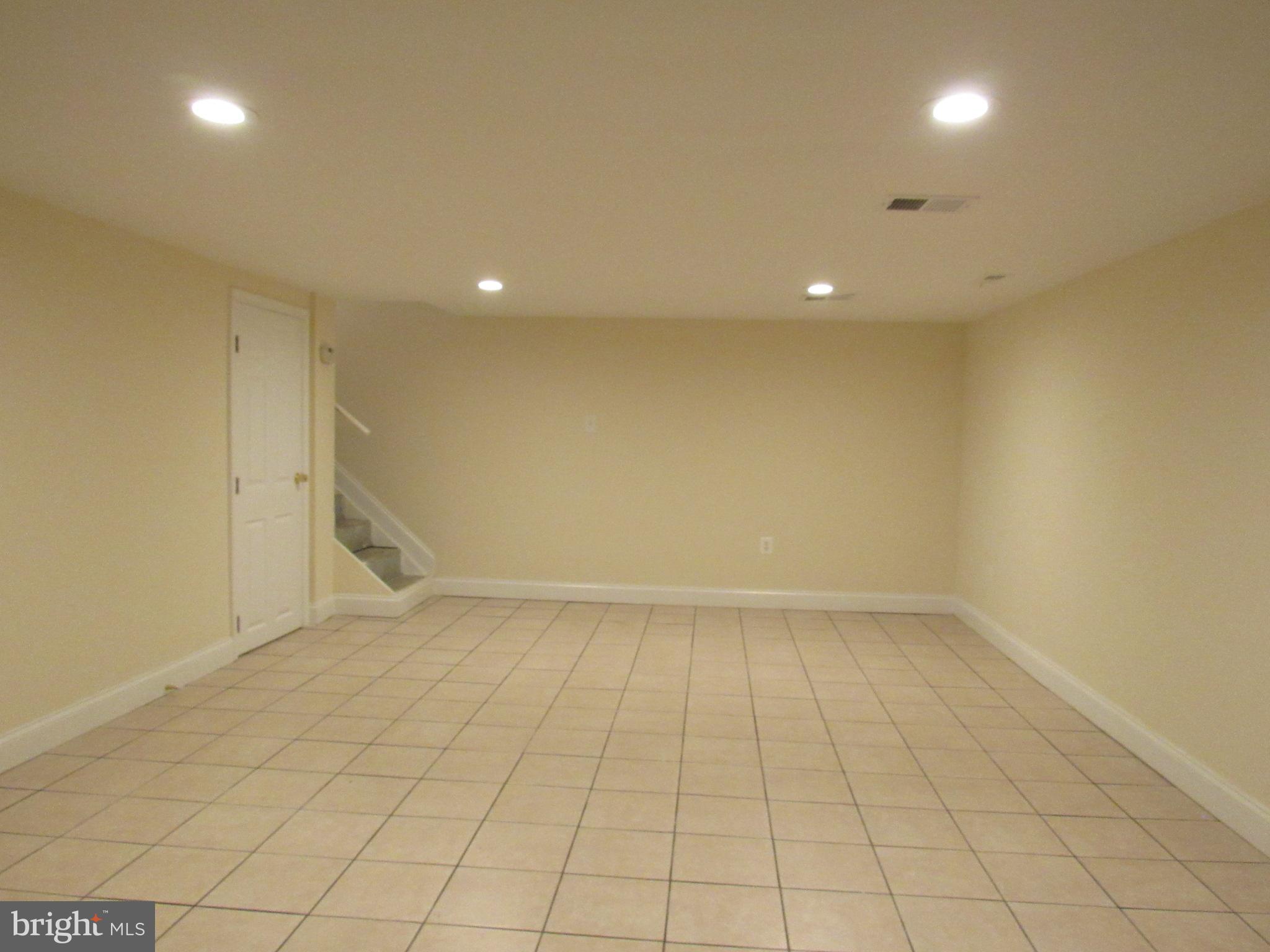 1700 Tioga Road Fort Washington, MD 20744 - Photo 23 of 30 Lower Level Family Room