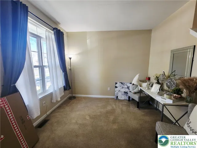 a workspace with furniture and window