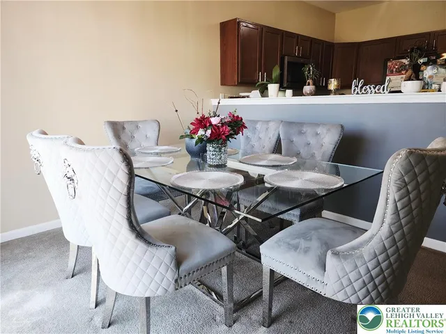 a view of a dining room with furniture