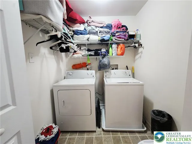 a utility room with dryer and washer