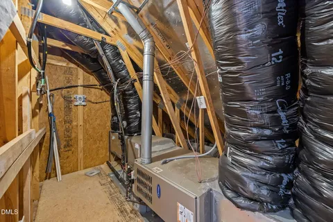 a view of a storage & utility room with a washer dryer