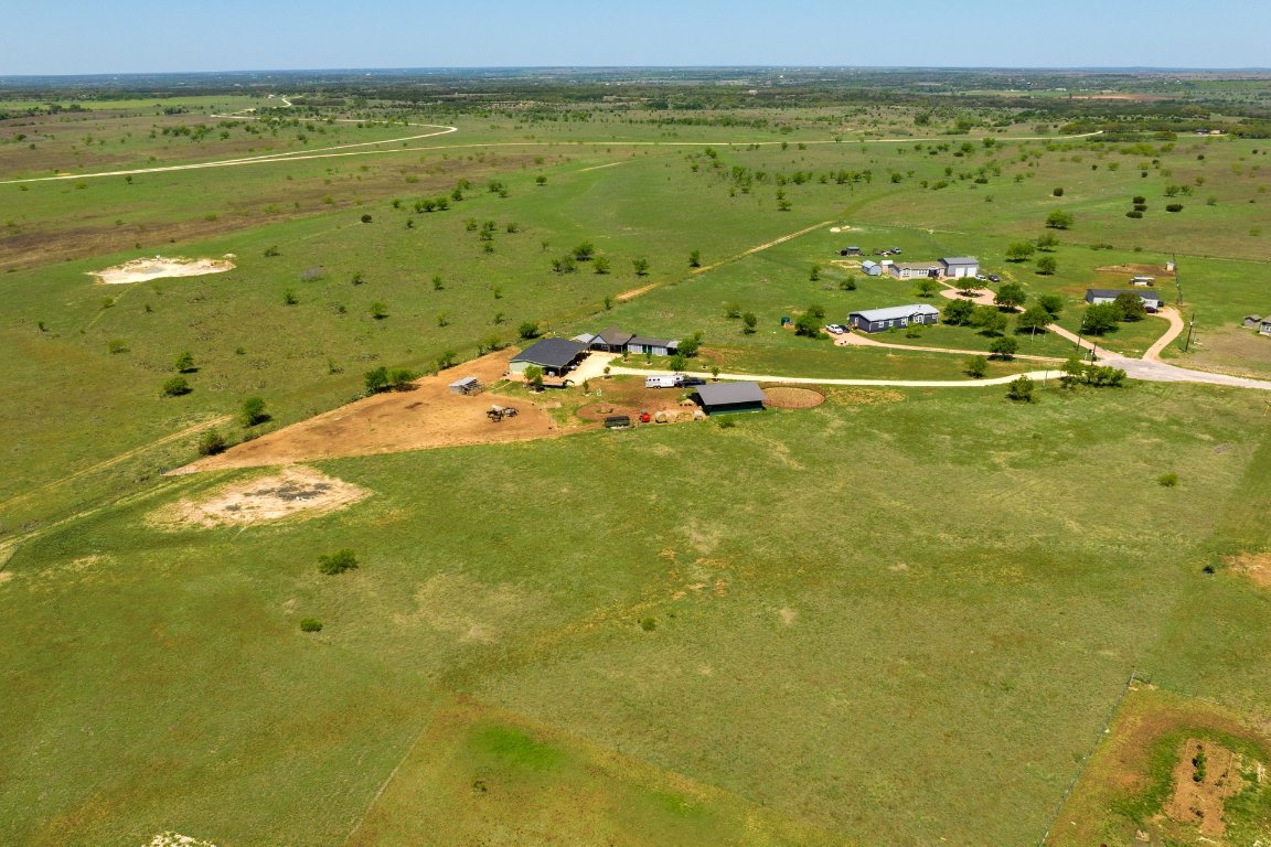 Lot 15 Samuel Drive Bertram, TX 78605 - Photo 8 of 17 a view of a lake with a houses