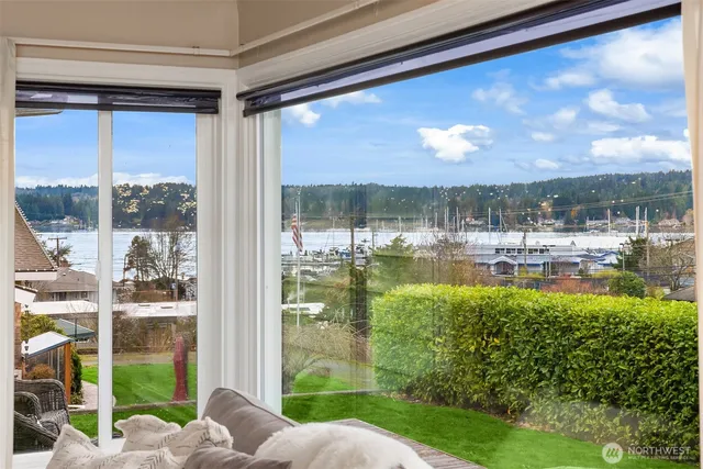 a view of a lake from a living room