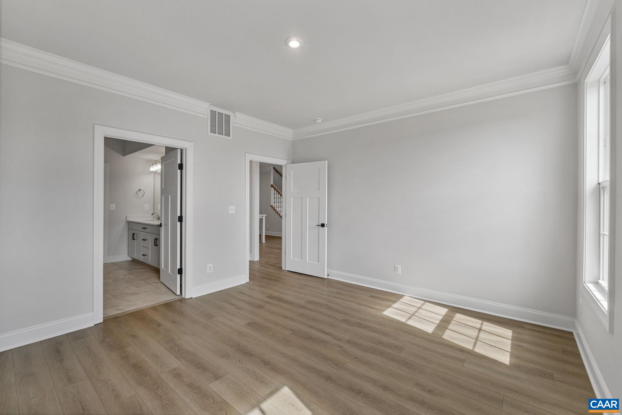 200 Marcella Street Charlottesville, VA 22911 - Photo 19 of 57 a view of empty room with wooden floor