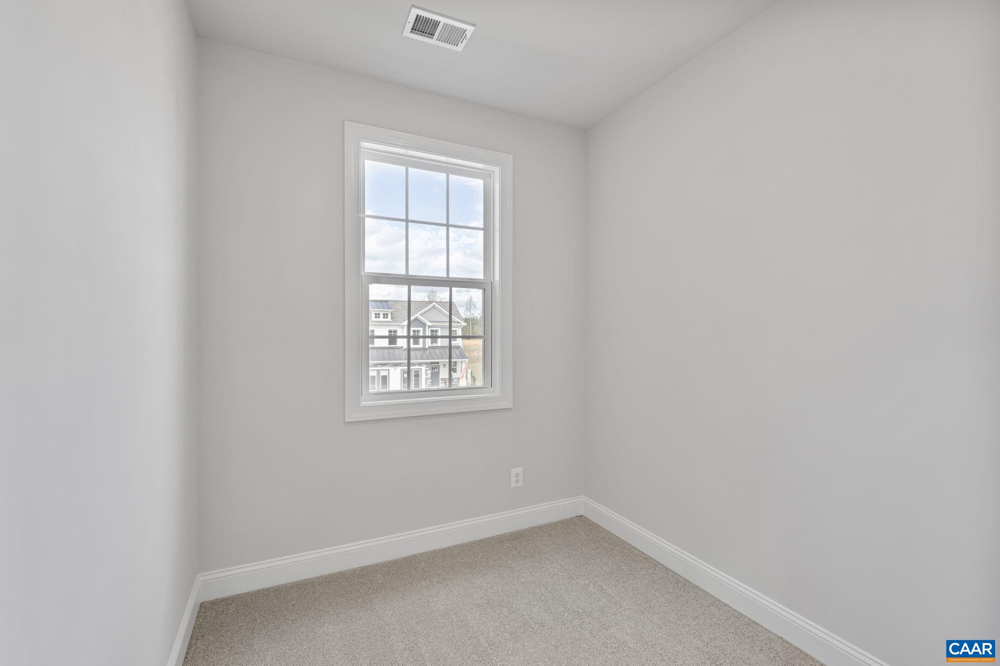 200 Marcella Street Charlottesville, VA 22911 - Photo 27 of 57 an empty room with a window