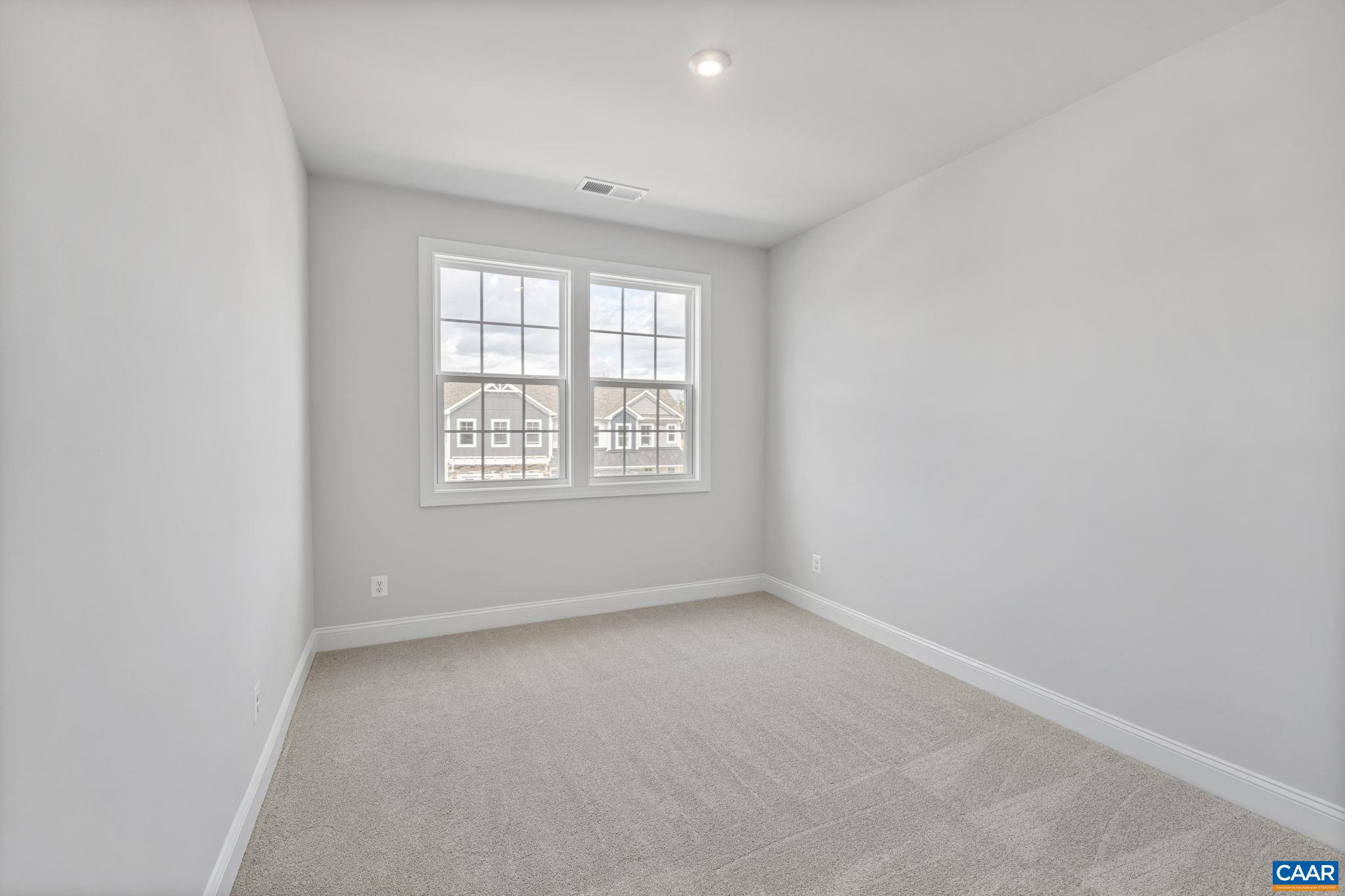 200 Marcella Street Charlottesville, VA 22911 - Photo 28 of 57 an empty room with a window