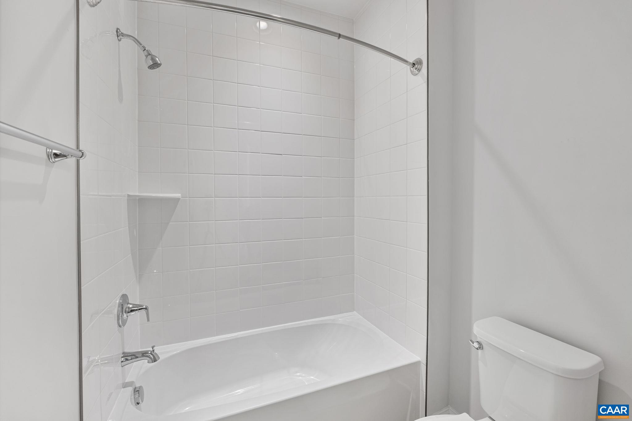 200 Marcella Street Charlottesville, VA 22911 - Photo 34 of 57 a bathroom with a bathtub and a toilet