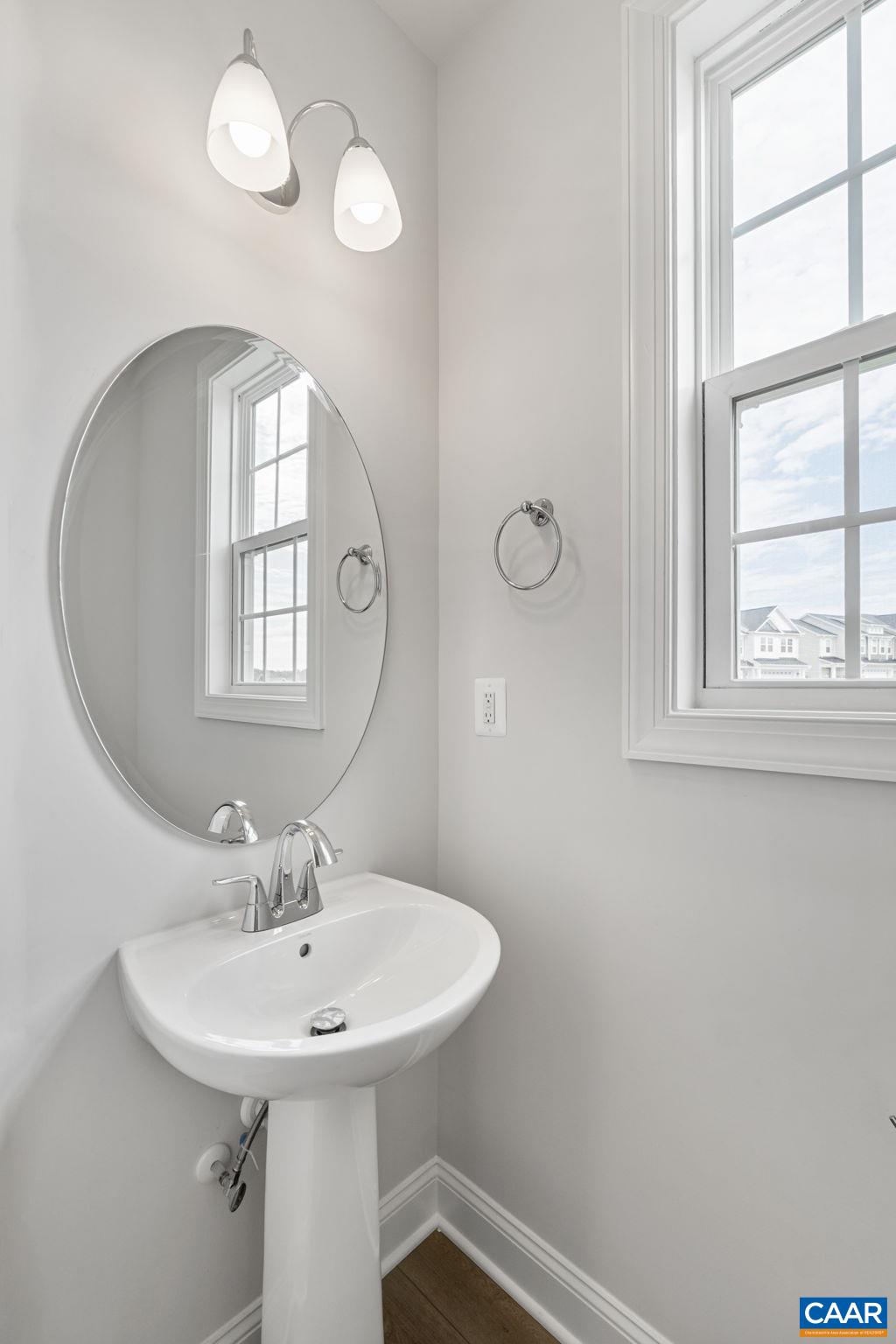 200 Marcella Street Charlottesville, VA 22911 - Photo 5 of 57 a bathroom with a sink and a mirror
