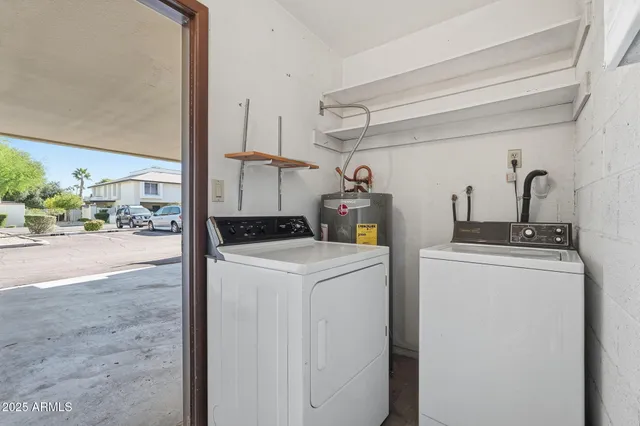 a utility room with dryer and washer