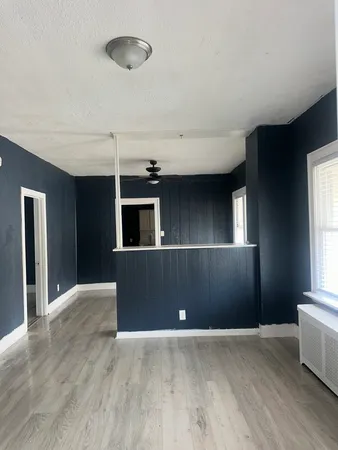 a view of livingroom with hardwood floor and window
