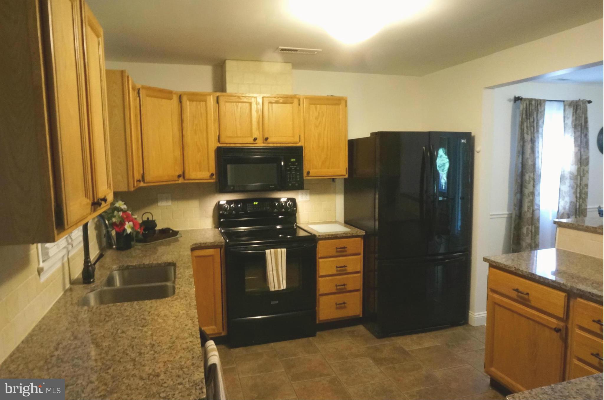 12704 Scaggsville Road Highland, MD 20777 - Photo 11 of 30 Kitchen Updated Appliances, Granite