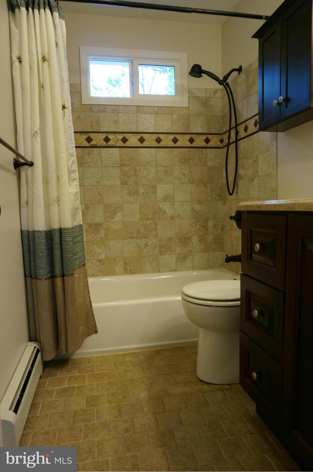 12704 Scaggsville Road Highland, MD 20777 - Photo 17 of 30 Hall Bath Remodeled - Ceramic Tub Walls - Floor