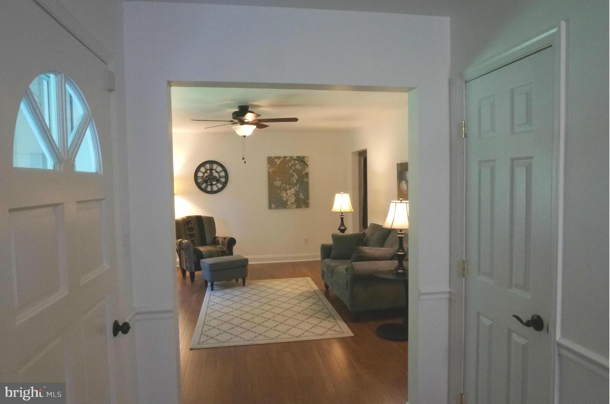 12704 Scaggsville Road Highland, MD 20777 - Photo 3 of 30 Foyer Into Living Room Looking From Dining Room