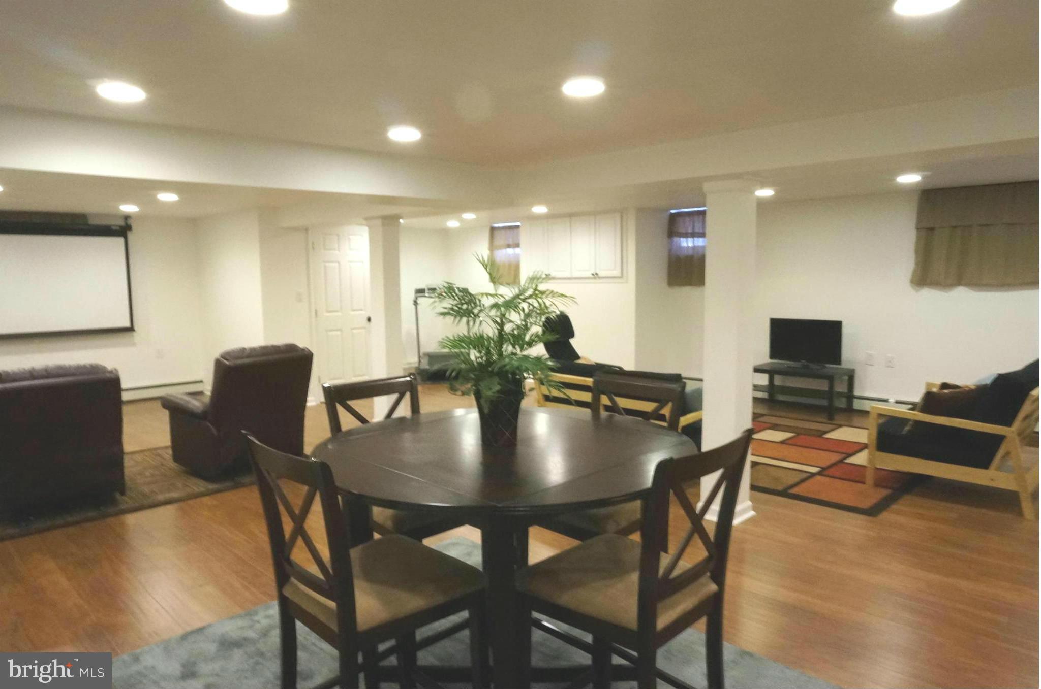 12704 Scaggsville Road Highland, MD 20777 - Photo 23 of 30 Large Family Room Offer Many Uses