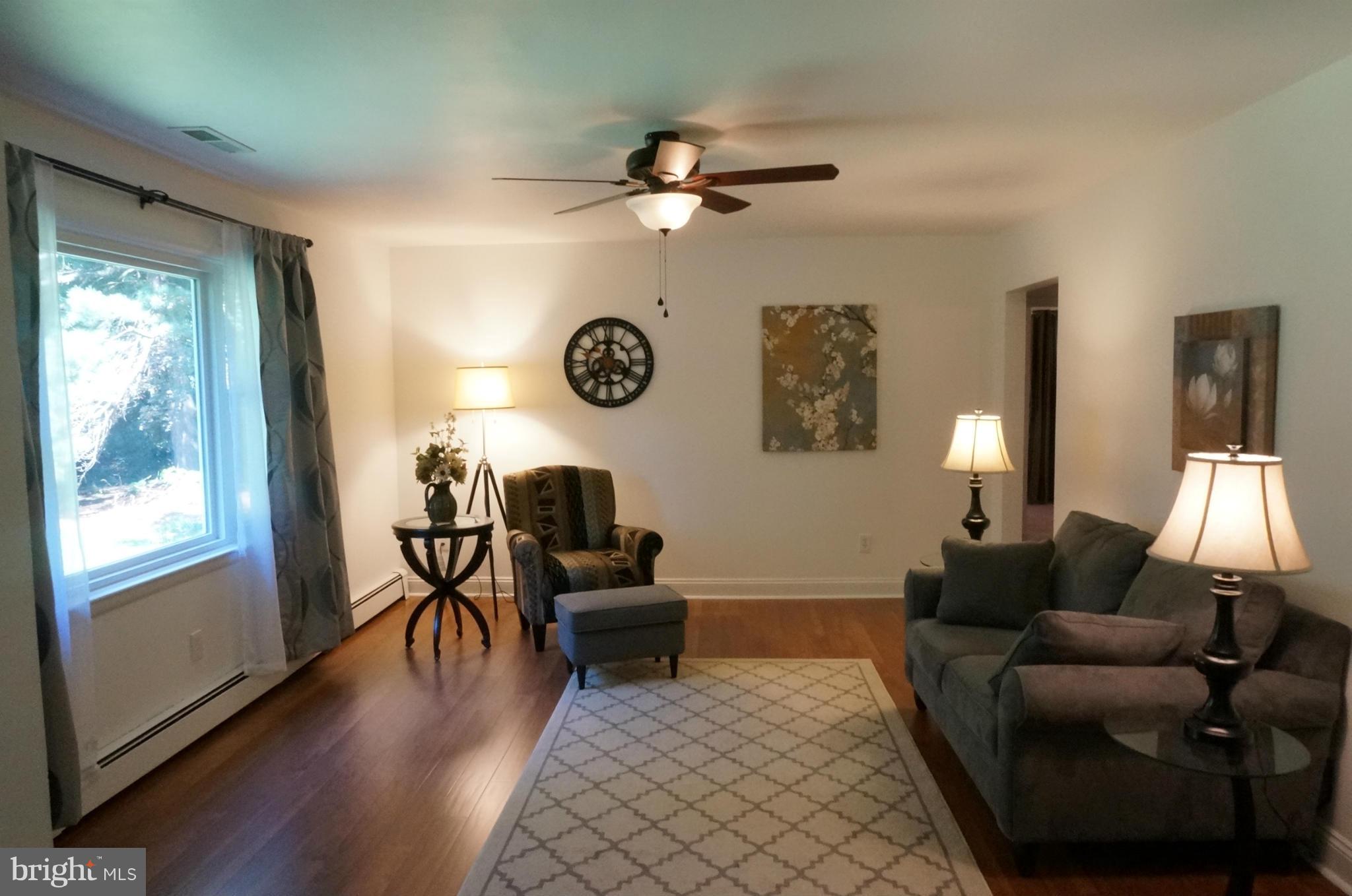 12704 Scaggsville Road Highland, MD 20777 - Photo 4 of 30 Living Room Natural Light From Picture Window