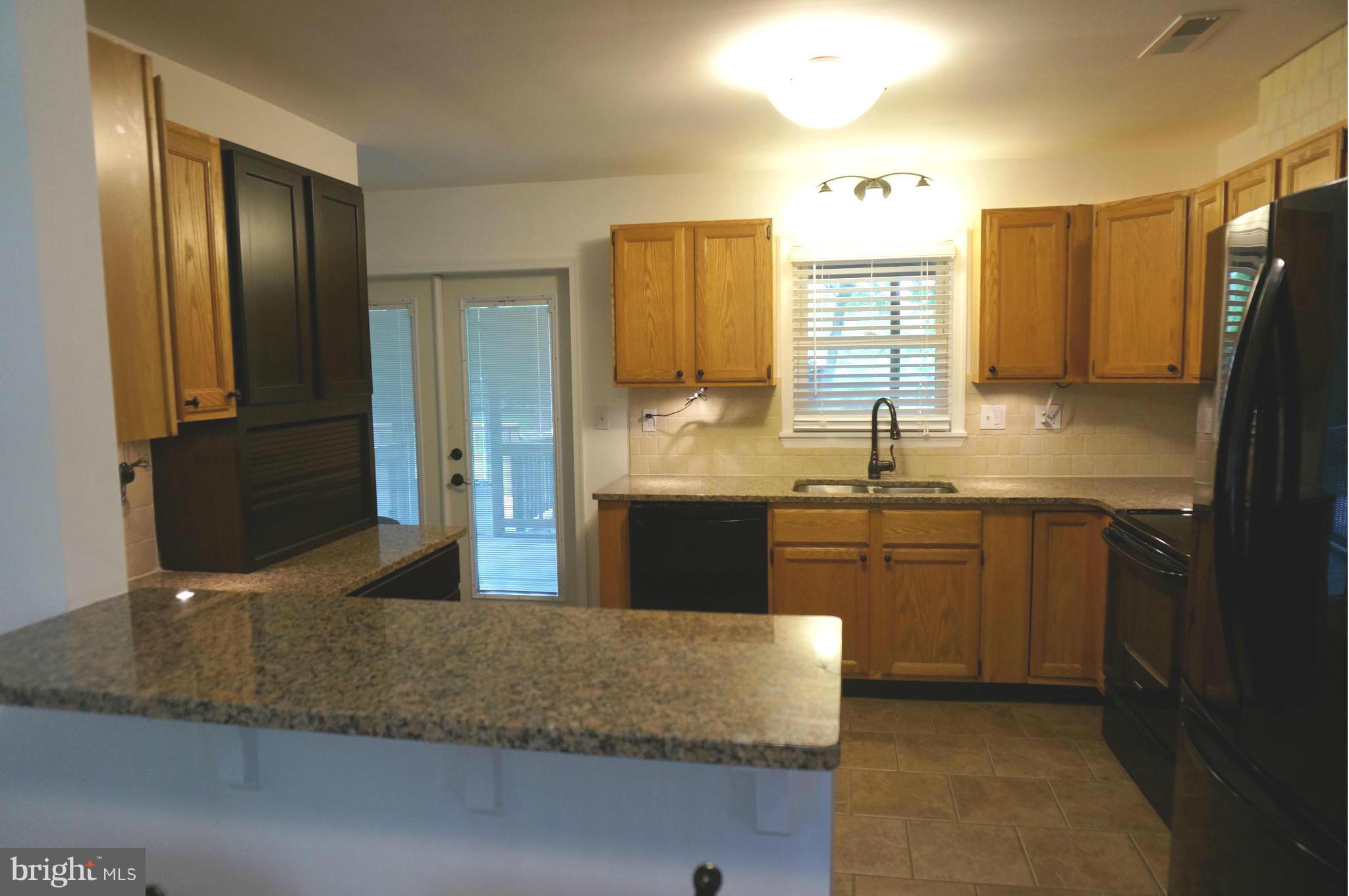 12704 Scaggsville Road Highland, MD 20777 - Photo 9 of 30 Remodeled Removed Wall Created Breakfast Bar