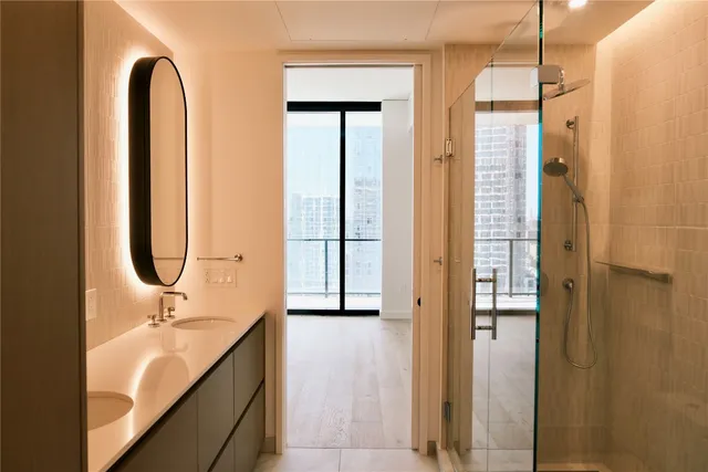 a view of a hallway with a room