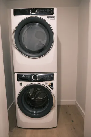 a house view with a swimming pool and sitting space