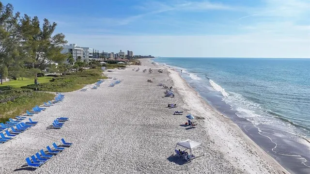 a view of ocean with a large building