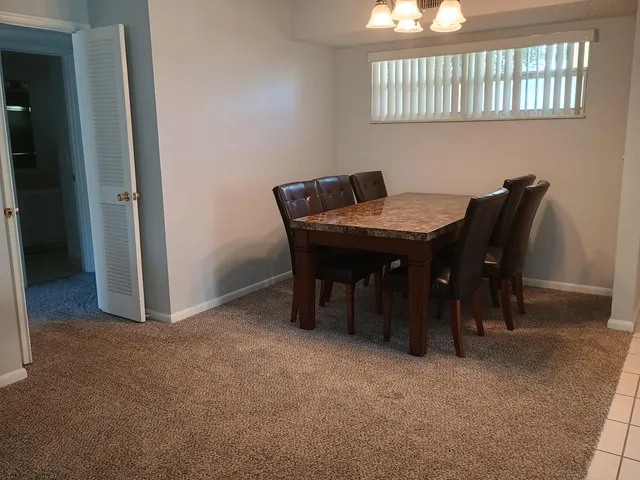 a bedroom with a bed and flat screen tv