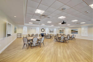 3 Colonial Club Drive, Unit 100 Boynton Beach, FL 33435 - Photo 21 of 26 a view of a dining room with furniture window and wooden floor