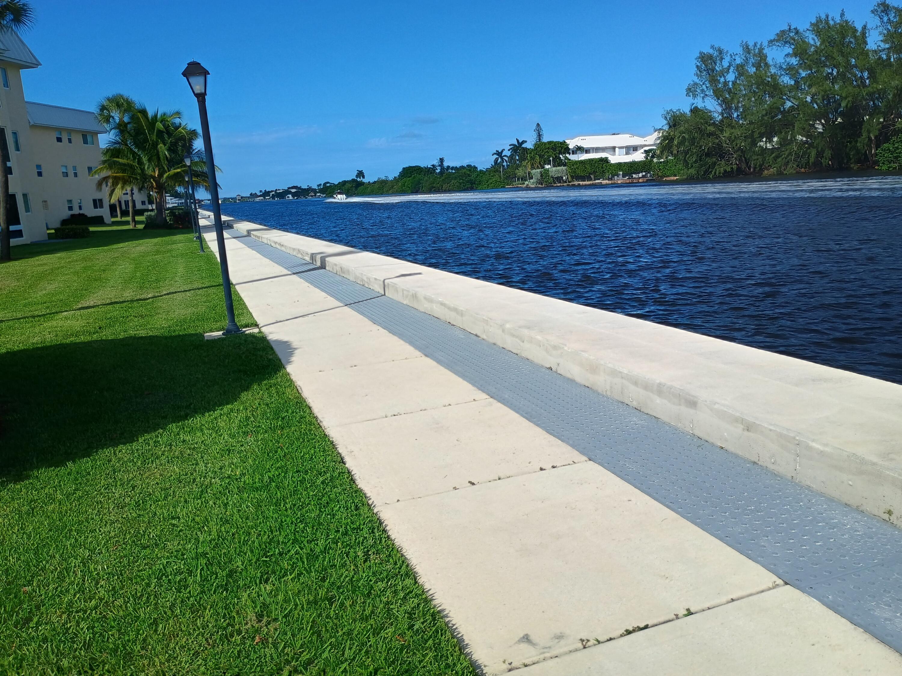 3 Colonial Club Drive, Unit 100 Boynton Beach, FL 33435 - Photo 6 of 26 a view of a back yard