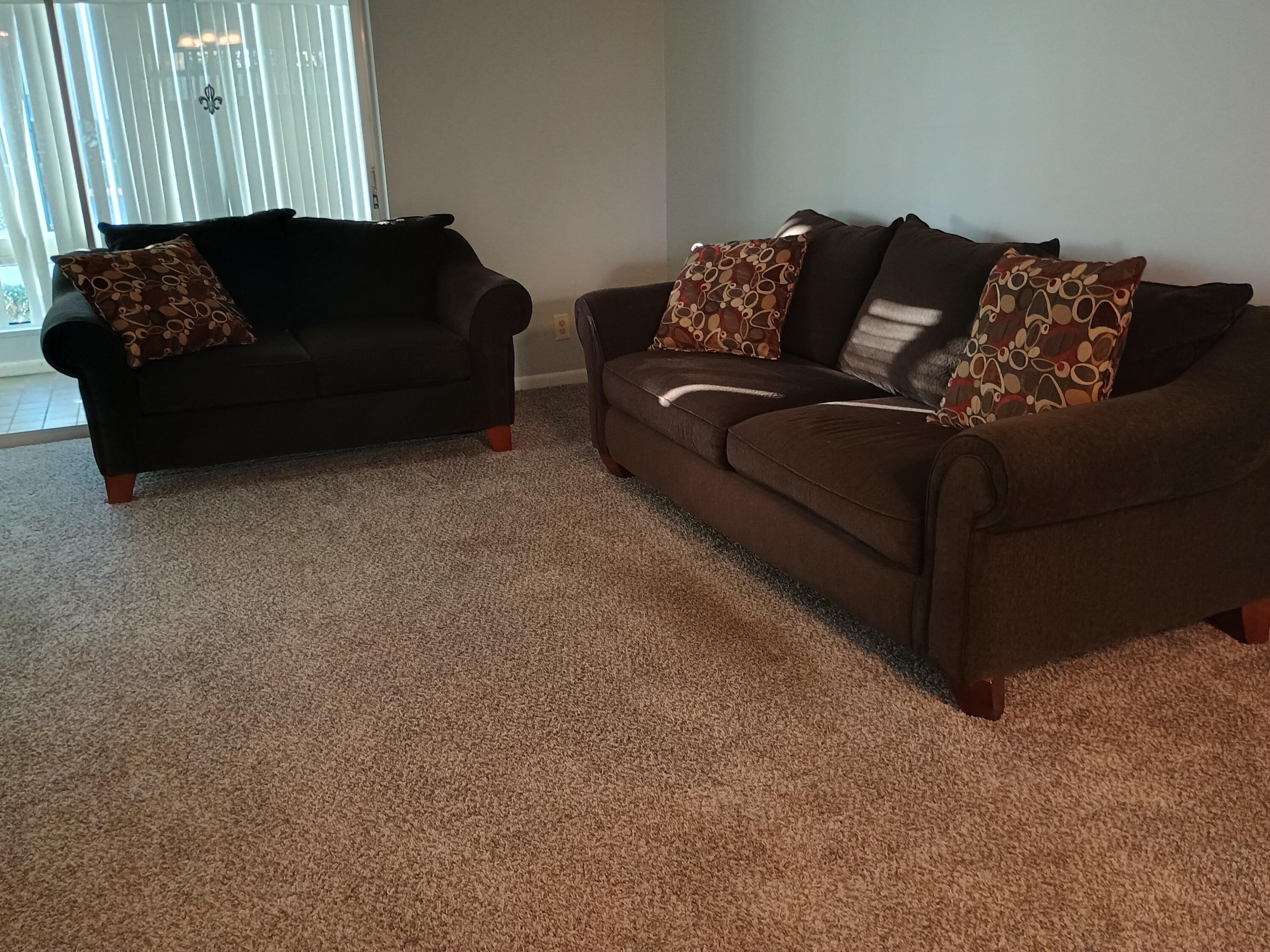 3 Colonial Club Drive, Unit 100 Boynton Beach, FL 33435 - Photo 10 of 26 a living room with furniture and a couch