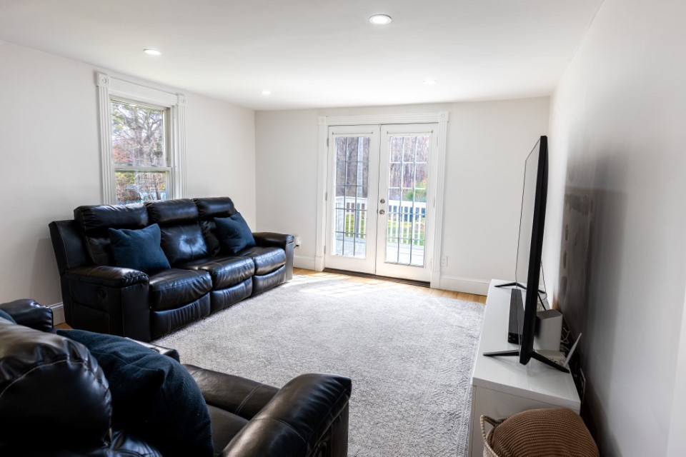 838 Centerville Road Warwick, RI 02886 - Photo 26 of 38 Living Room with door to balcony