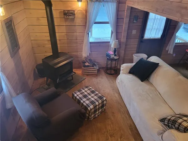 a bedroom with furniture and a potted plant