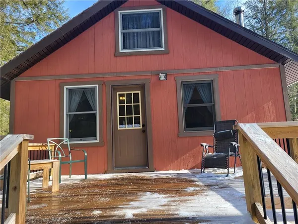 a backyard of a house with seating space