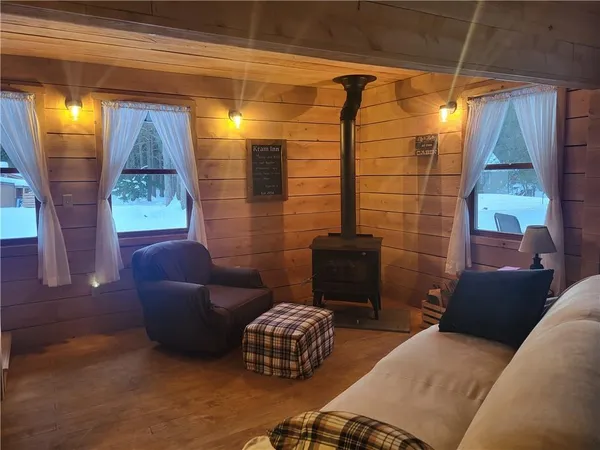 a outdoor living space with furniture and a fireplace