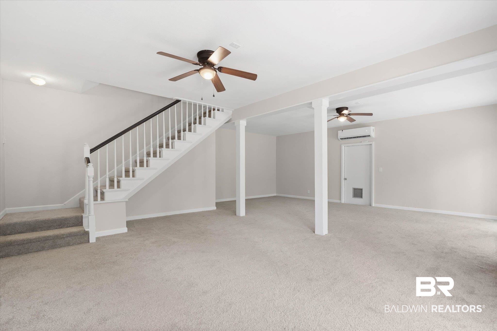 106 Melanie Loop Daphne, AL 36526 - Photo 18 of 45 Unfurnished living room with ceiling fan and light carpet