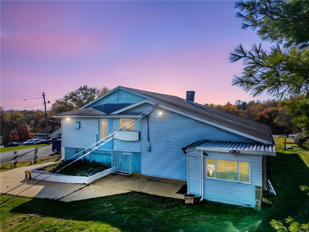 100 Bank Street Grindstone, PA 15442 - Photo 1 of 50 a house view with a garden space