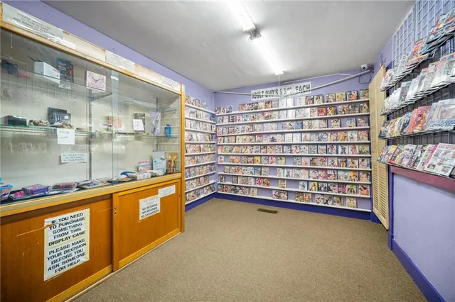 a bathroom with a sink toilet and a tub