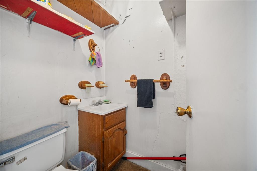 100 Bank Street Grindstone, PA 15442 - Photo 34 of 50 a bathroom with a sink toilet and a tub