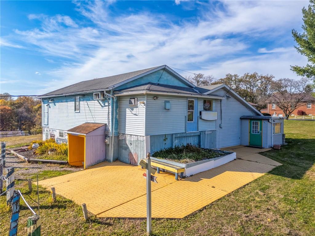 100 Bank Street Grindstone, PA 15442 - Photo 40 of 50 a front view of a house with yard