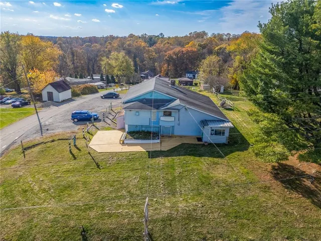a front view of house with outdoor space