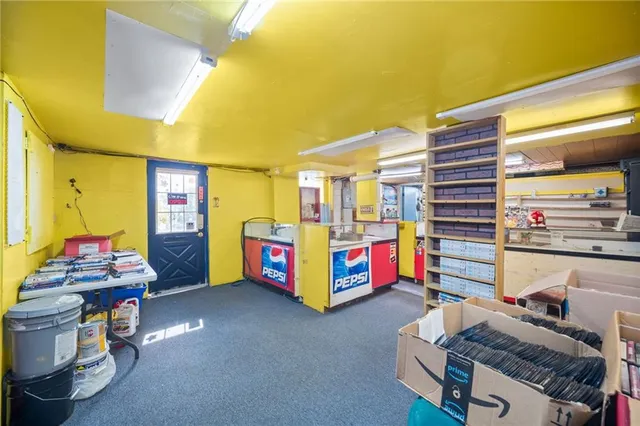 a living room with furniture and a table