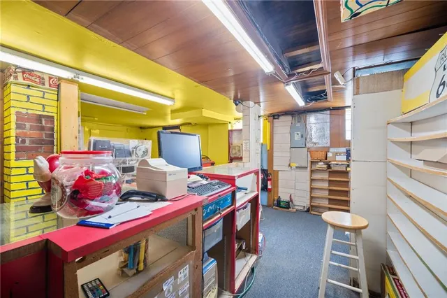 a bedroom with furniture and a window