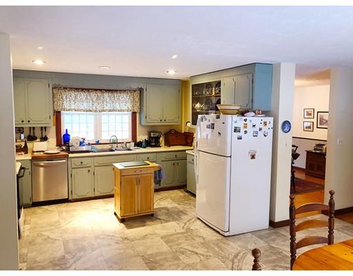 127 W Road Petersham, MA 01366 - Photo 9 of 12 a kitchen with a refrigerator and a stove top oven