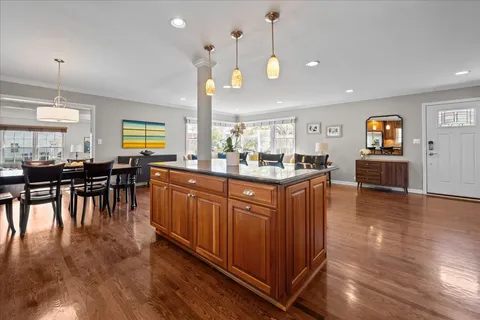 a kitchen with lots of counter space and dining table