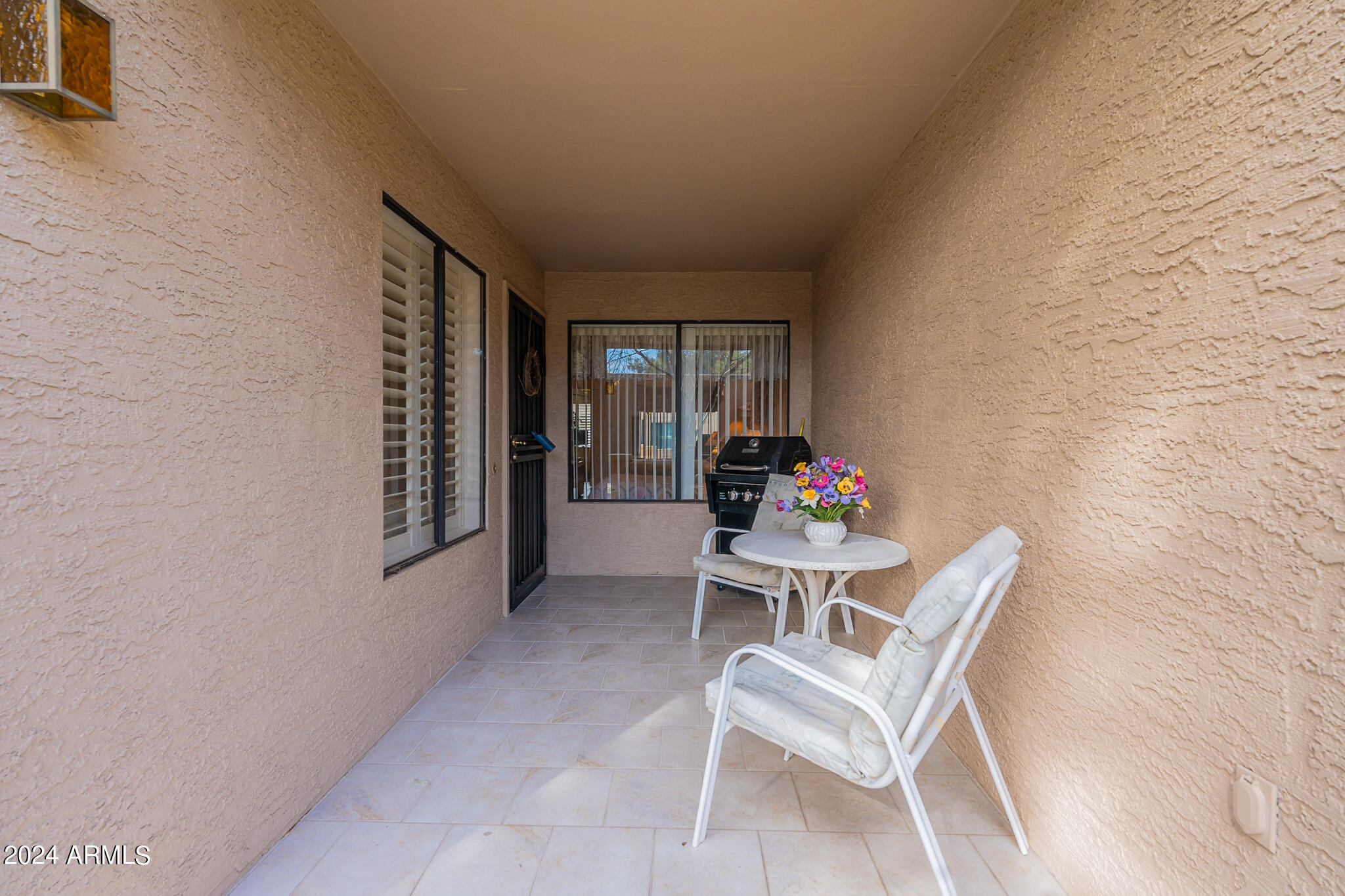 14300 West Bell Road, Unit 5 Surprise, AZ 85374 - Photo 3 of 15 Covered Patio_BBQ