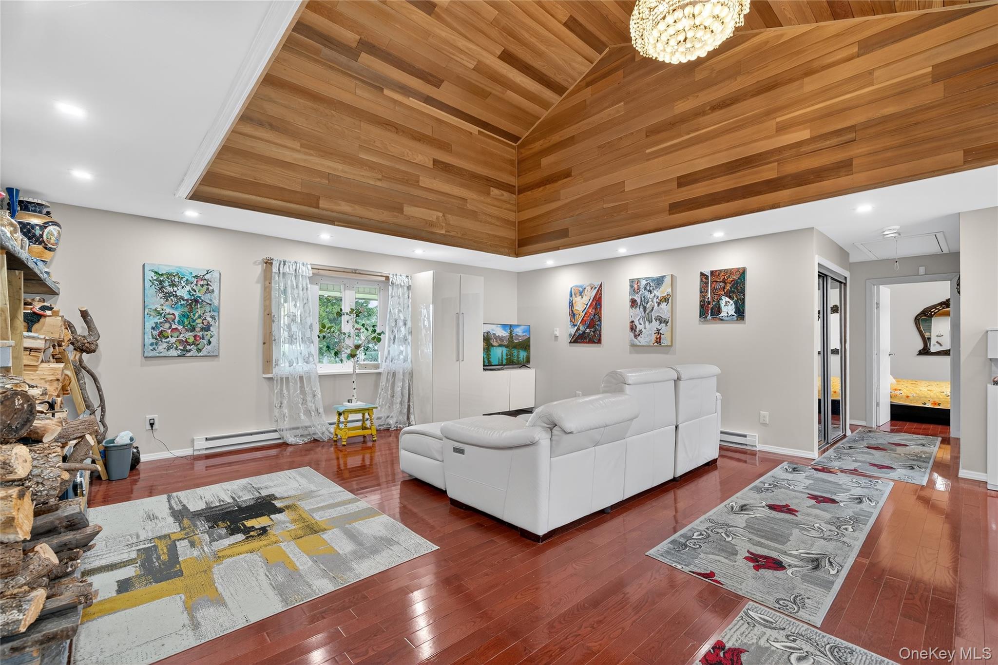 6049 State Rte 55 Liberty, NY 12754 - Photo 16 of 50 a living room with furniture and wooden floor