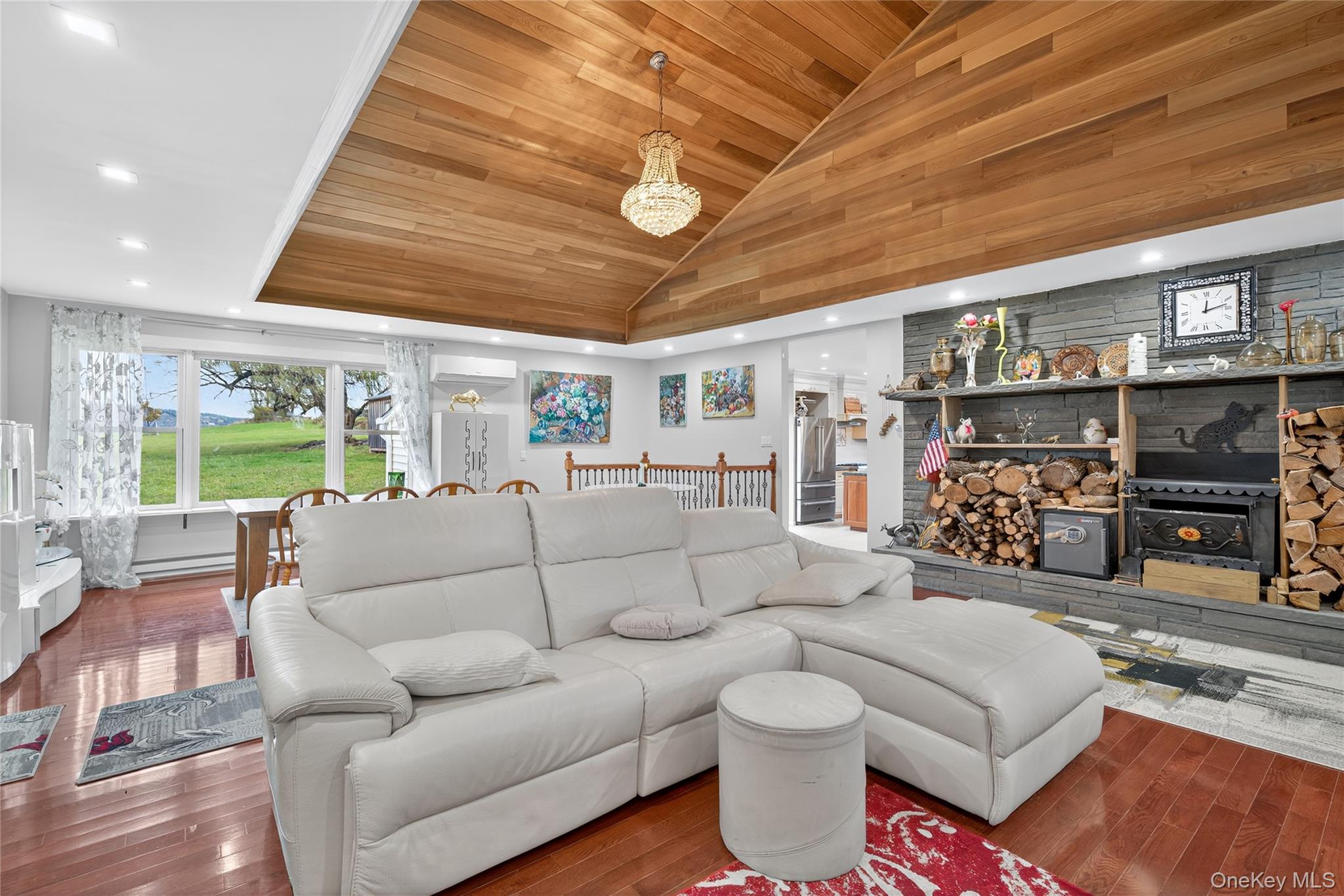 6049 State Rte 55 Liberty, NY 12754 - Photo 18 of 50 a living room with furniture and a flat screen tv
