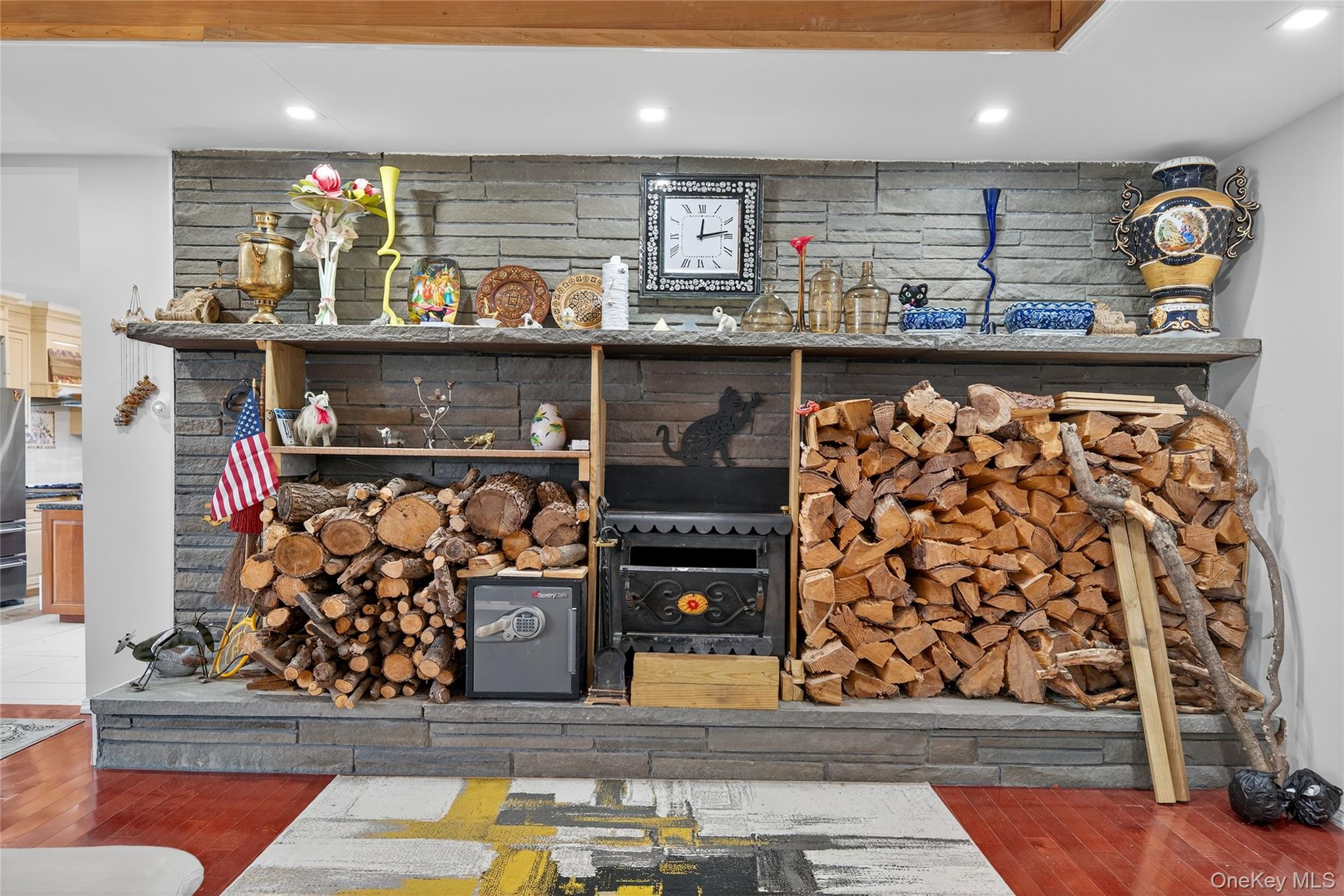 6049 State Rte 55 Liberty, NY 12754 - Photo 19 of 50 a kitchen with stainless steel appliances kitchen island granite countertop a refrigerator oven a sink and dishwasher