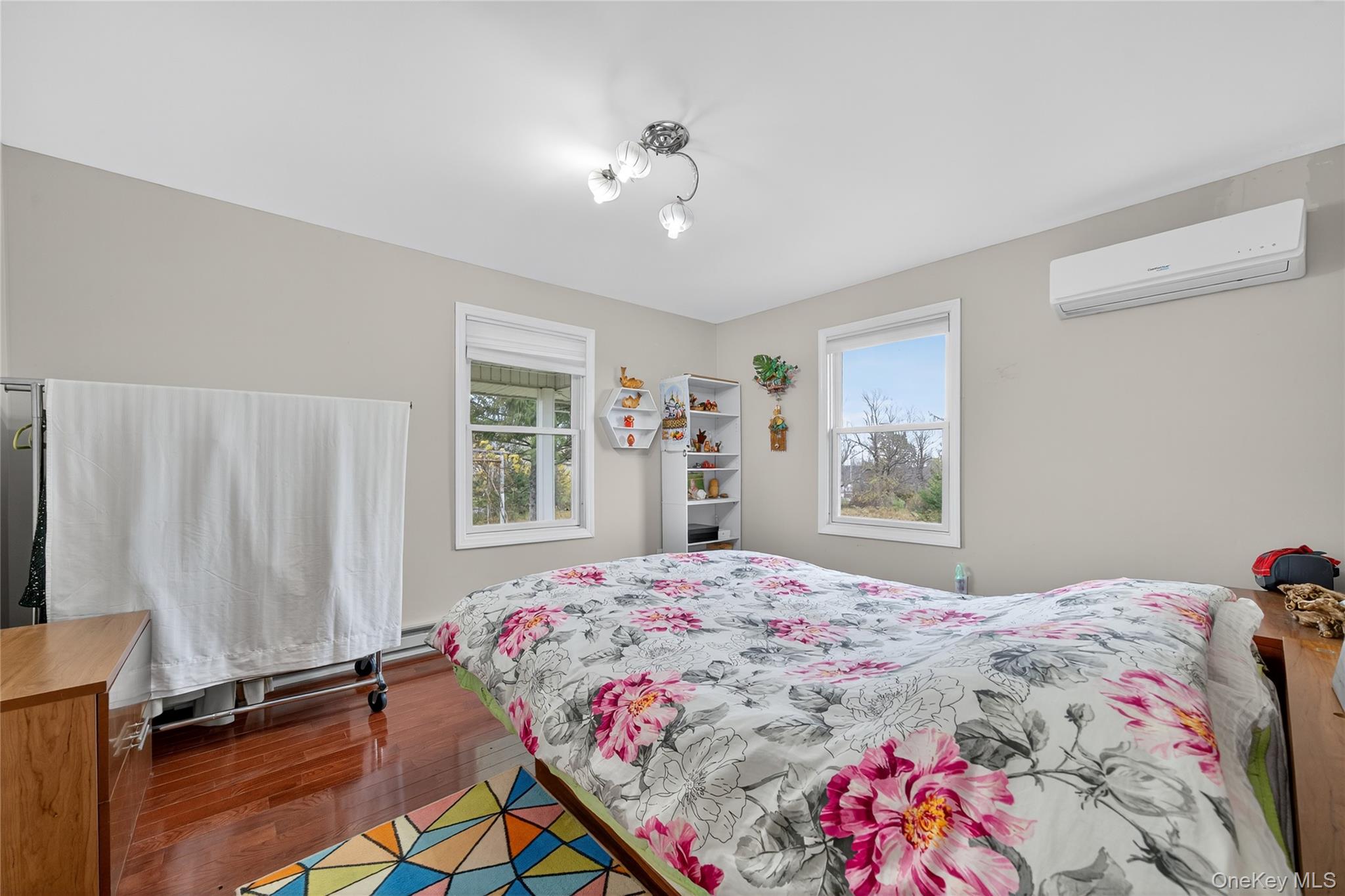 6049 State Rte 55 Liberty, NY 12754 - Photo 24 of 50 a bedroom with a bed and a window