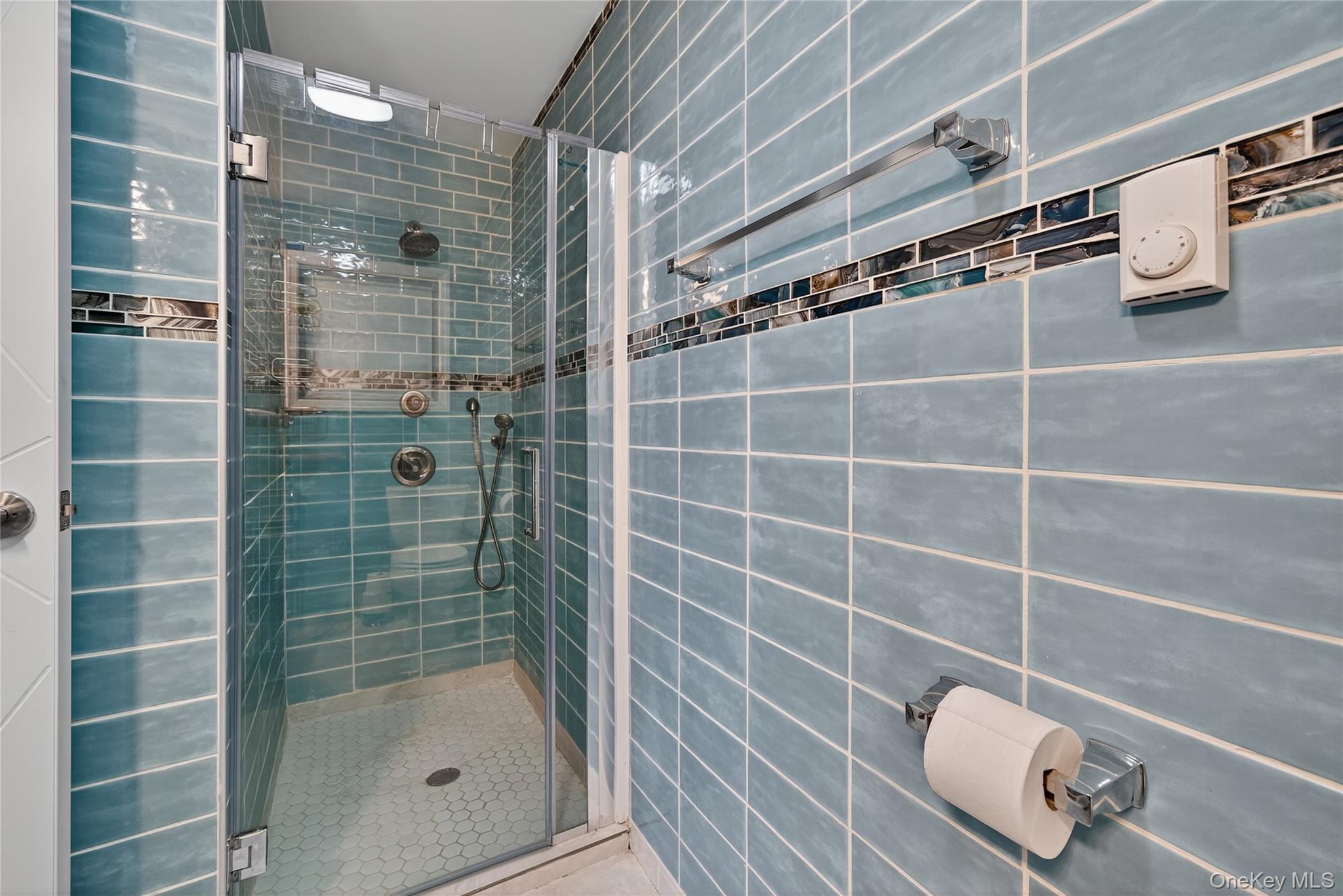 6049 State Rte 55 Liberty, NY 12754 - Photo 27 of 50 a bathroom with a shower