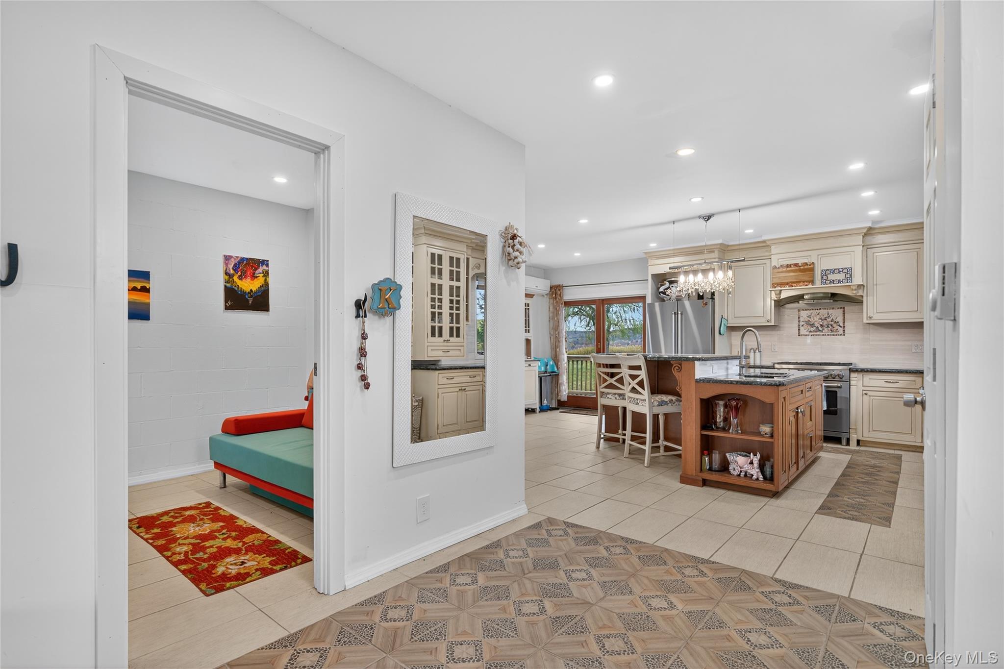 6049 State Rte 55 Liberty, NY 12754 - Photo 3 of 50 a living room with stainless steel appliances furniture a rug and a view of kitchen