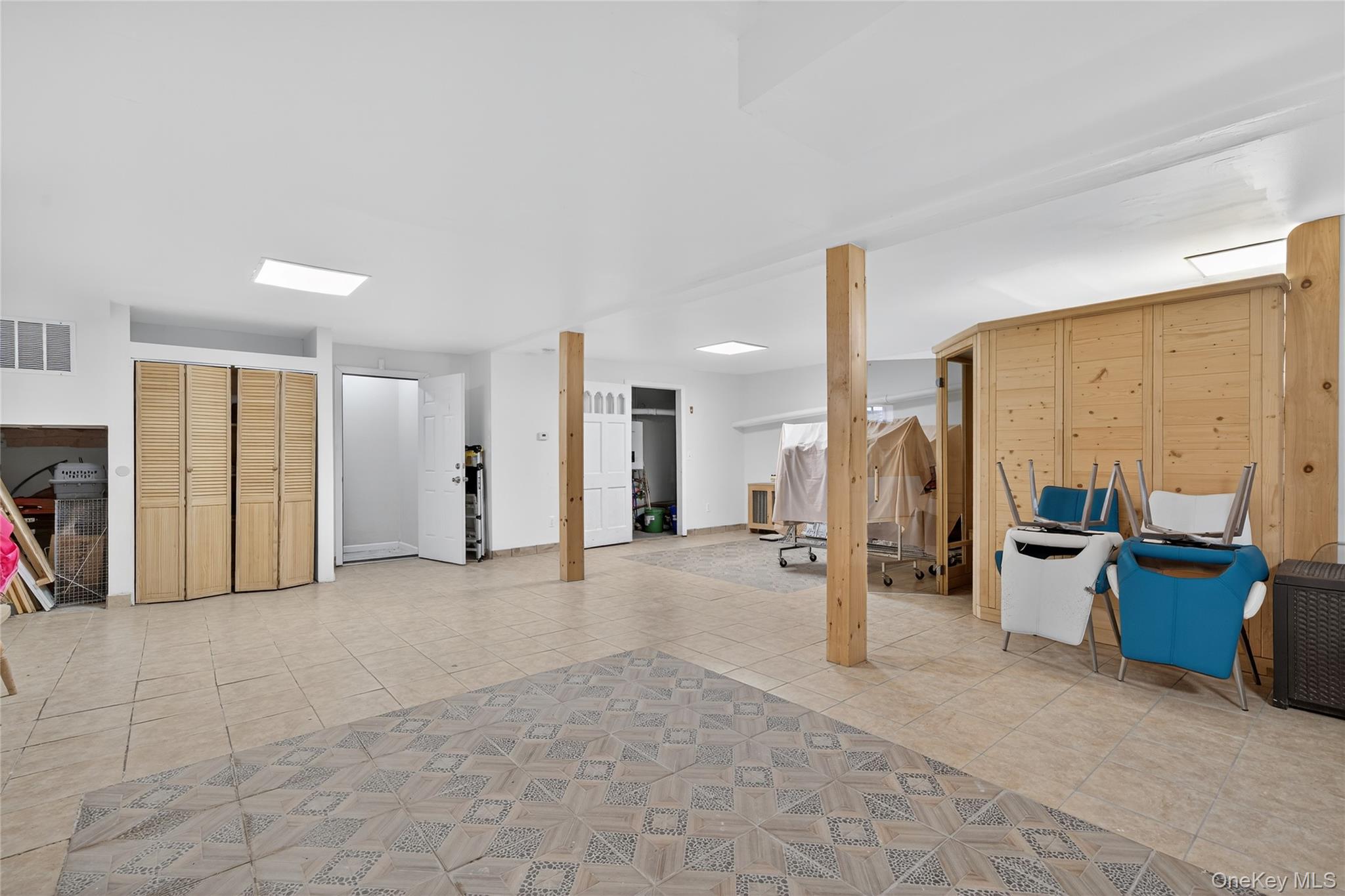 6049 State Rte 55 Liberty, NY 12754 - Photo 31 of 50 a view of a livingroom with furniture and a flat screen tv